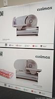 Two boxed Cusimax food slicers, model CHF-200, stacked with clear branding and product image on each box.