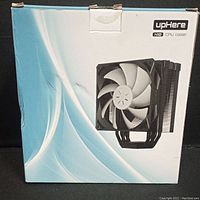 UpHere N10 CPU cooler factory box showing fan and heatsink image.