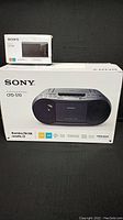 Sony boxed items: ICF-P36 FM/AM radio and CFD-S70 boombox box
