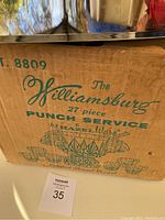 Box with printed details showing The Williamsburg 27 piece punch service by Hazel Ware with sketch of punch bowl and cups
