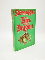 Front standing view of the book showing bright green dust jacket with title and dragon image