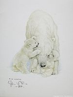 Close-up of the polar bear and cubs artwork showing detail of the print, signature, and date.