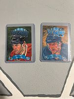 Front of 1993 Donruss Ice Kings hockey cards showing painted portraits of Chris Chelios and Pat Lafontaine.