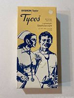 Photo of the yellow and blue Sybron Taylor Tycos stethoscope box with vintage-style artwork of medical professionals.