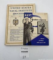Top view of both booklets showing front covers: the April 1937 Naval Institute Proceedings and the Navy Seabee Reserve recruitment booklet.