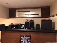 Overview of all components including receiver, floor speakers, subwoofer, center and bookshelf speakers