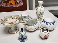 Front and top view of all porcelain items on table showing patterns and designs