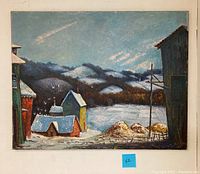 Frontal view of the full painting showing colored buildings, snow, hills and sky.