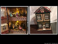 Interior view of upper and lower levels inside the house with illuminated Christmas figurine scenes.