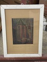 Framed pastel painting showing entire artwork with white frame and brown matting