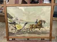 Full view of the horse carriage artwork painting mounted in an extended wooden frame, showing the full composition.