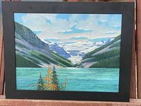 Full view of framed painting showing landscape scene