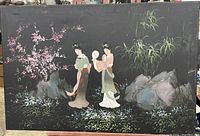 Front view of the painting showing two women in traditional Asian clothes among flowers and rocks on a dark background.