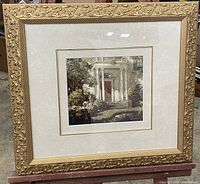 Full image of framed artwork showing the palace entrance with ornate gold frame and double matting.