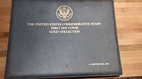 Front cover of a leather-bound album embossed with 'THE UNITED STATES COMMEMORATIVE STAMP FIRST DAY COVER GOLD COLLECTION A LIMITED EDITION'