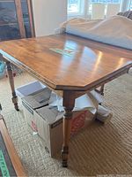 Overview of table top and legs showing finish and overall form
