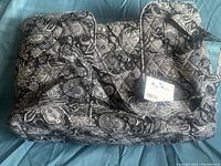 Full view of the Mary Maxim craft bag laid flat showing pattern, handles, and structure.