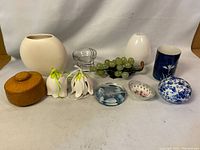 Full lot view showing all assorted vases, trinket dishes, wood box, and glass grape cluster.