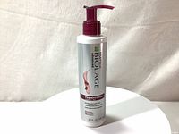 Full front view of the 200ml Matrix Biolage hair cream bottle with pump dispenser on white background.