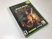 Front cover of the new factory sealed Xbox Star Wars Knights of the Old Republic video game showing all branding and details.