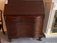 Front view of desk with drop front closed