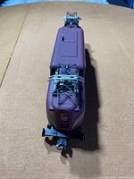 Front view of Lionel CG-1 locomotive showing pantographs and front details.