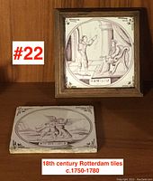 Two framed 18th century Dutch Rotterdam tiles, 5 inches square each, showing purple monochrome scenes.