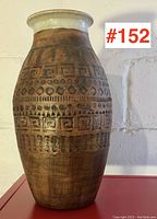 Front view of the pottery vase showing full body and patterned decoration.