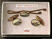 Three pieces (pair of cufflinks and tie bar) in presentation box