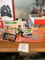 Mario Kart Live Home Circuit Luigi Set box with visible Luigi kart and AR track components