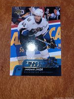 Front of Jaromir Jagr hockey card showing player in Washington Capitals uniform, holographic elements, Upper Deck logo visible.