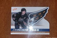 Front of Jaromir Jagr Washington Capitals McDonald's collectible hockey card showing player in black jersey with Capitals wing logo design on right side of card.