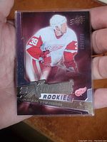 Front of Johan Franzen rookie hockey card with holo foil and serial number