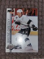 Front of Wayne Gretzky LA Kings Pro Set hockey card showing player in uniform on ice.