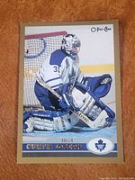Front of Curtis Joseph O-Pee-Chee oversized hockey card showing goalie in Toronto Maple Leafs uniform.