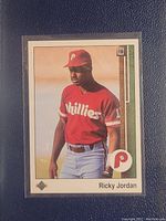 Front of Ricky Jordan baseball card showing him in Phillies uniform.