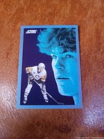 Front of the card showing Jaromir Jagr in Penguins uniform with a large blue portrait and smaller action shot.