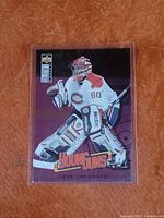 Front side of Jose Theodore Young Guns hockey card with player image and branding