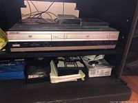 Front view of Sony combined DVD and VHS player with media slots and control buttons visible