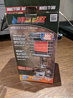 Box of Dura Heat Model TT-360 portable propane heater detailing 360 degree heating, 40,000 BTUs output, 14 hour runtime, and tip-over shut off features.