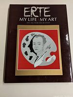 Front cover of the coffee table book showing the title and an illustrated portrait of Erté.