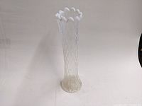 Front view showing full height of the slender opalescent glass vase with diamond and oval thumbprint pattern.