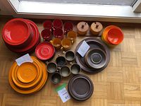 Overall view showing all ceramic pieces and wooden canisters