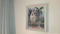 Photo of the framed oil painting hanging on a wall showing the full view of the artwork.