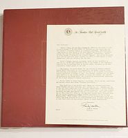 Two sealed red vinyl record albums from Franklin Mint with original letters inside, in unopened condition, Volumes 27 and 28.