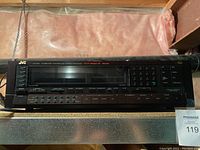 Front panel view of JVC R-X400 showing overall condition and display area.