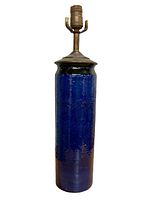 Full view of the vintage cobalt blue ceramic lamp with metal top fixture.
