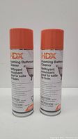 Two cans of HDX Foaming Bathroom Cleaner with orange caps and white labels showing front and side views.