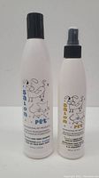 Front of the two bottles showing design and branding
