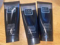 Three tubes of Black Suede After Shave Conditioner, 75 ml or 2.5 fl oz each, arranged side by side.